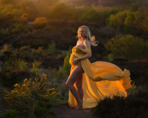 Bump photography, expectant mama wearing yellow dress at Thurstaston, Wirral